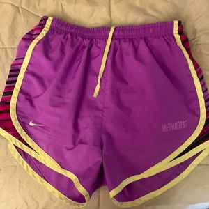 Purple Nike shorts